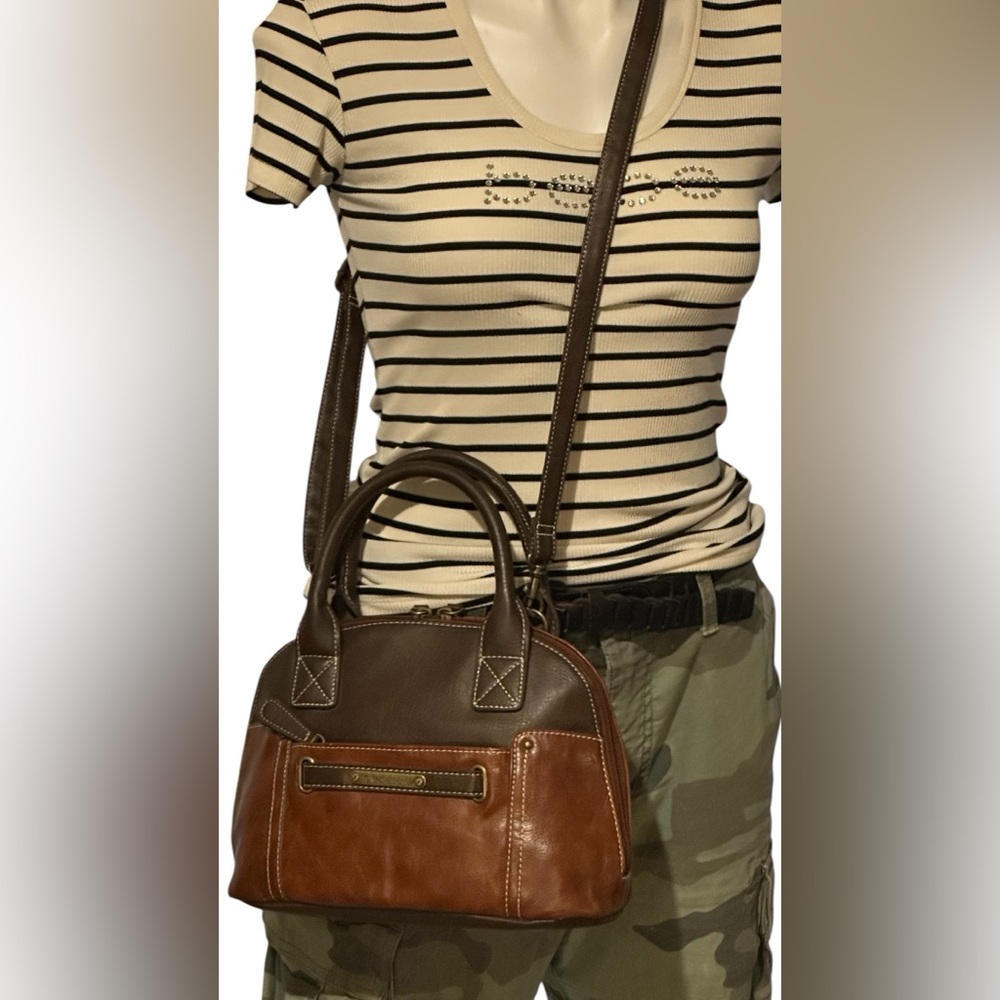 Stone Mountain USA, two tone crossbody bag. W / A 49” adj. shoulder strap.